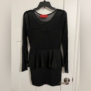 Black peplum mini dress with sheer sleeves. Perfect NYE dress!